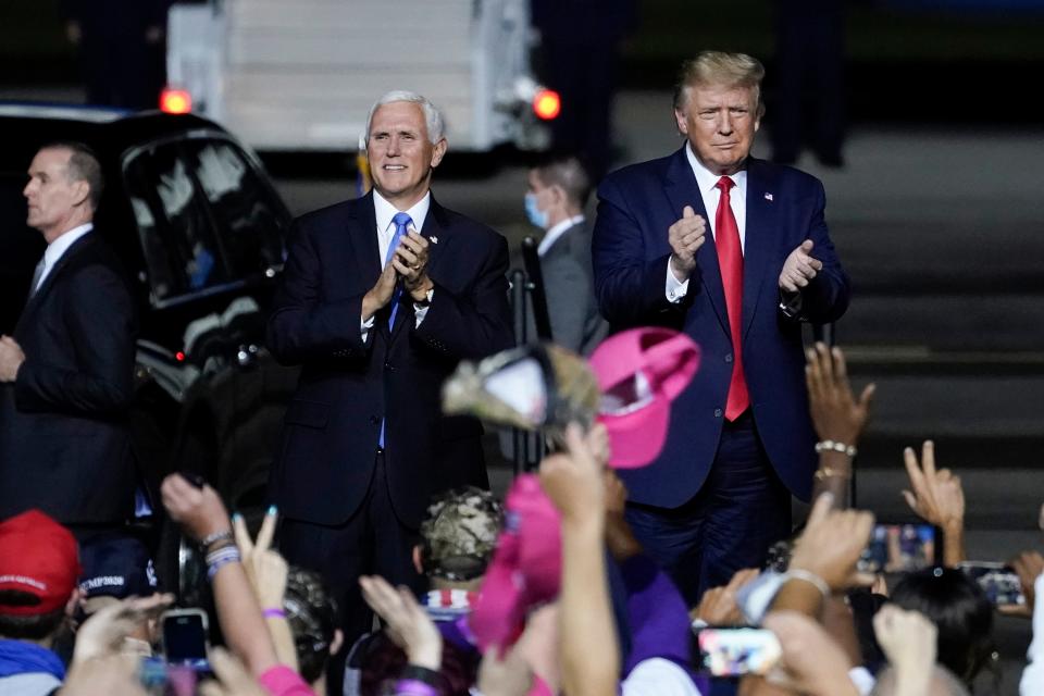 SEPTEMBER 25: U.S. President Donald Trump and Vice President Mike Pence arrive for a campaign rally at Newport News/Williamsburg International Airport on September 25, 2020.