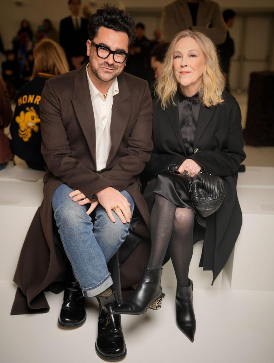 PARIS, FRANCE - MARCH 03: Dan Levy and Catherine O'Hara at Loewe Fall 2023 Ready To Wear Runway Show on March 3, 2023 at Chateau de Vincennes in Paris, France. (Photo by Swan Gallet/WWD via Getty Images)