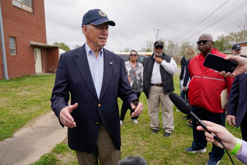President Joe Biden speaks with members of the media after a briefing in Rolling Fork, Miss., Friday, March 31, 2023. Biden traveled Rolling Fork to survey the damage after a deadly tornado and severe storm moved through the area. Housing and Urban Development Secretary Marcia Fudge, Rep. Bennie Thompson, D-Miss., and Rolling Fork Mayor Eldridge Walker look on.