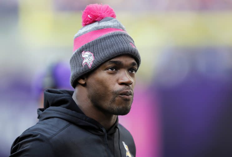 Three potential suitors for Adrian Peterson: the Vikings, Packers and Raiders. (AP) 