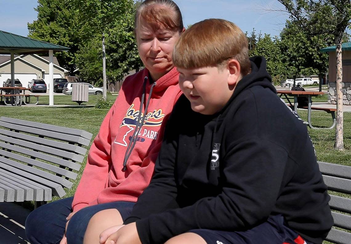 “I miss being able to make new friends,” said Jake Boyer, 12, while sitting in a park near his home. Tracie Boyer, Jake’s mom, pulled Jake out of public school after the alleged use of a seclusion room.