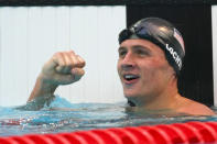 Ryan Lochte of the United States celebrates victory after the Men's 200m Backstroke Final at the National Aquatics Center on Day 7 of the Beijing 2008 Olympic Games on August 15, 2008 in Beijing, China. Lochte won in a new world record time of 1:53.94