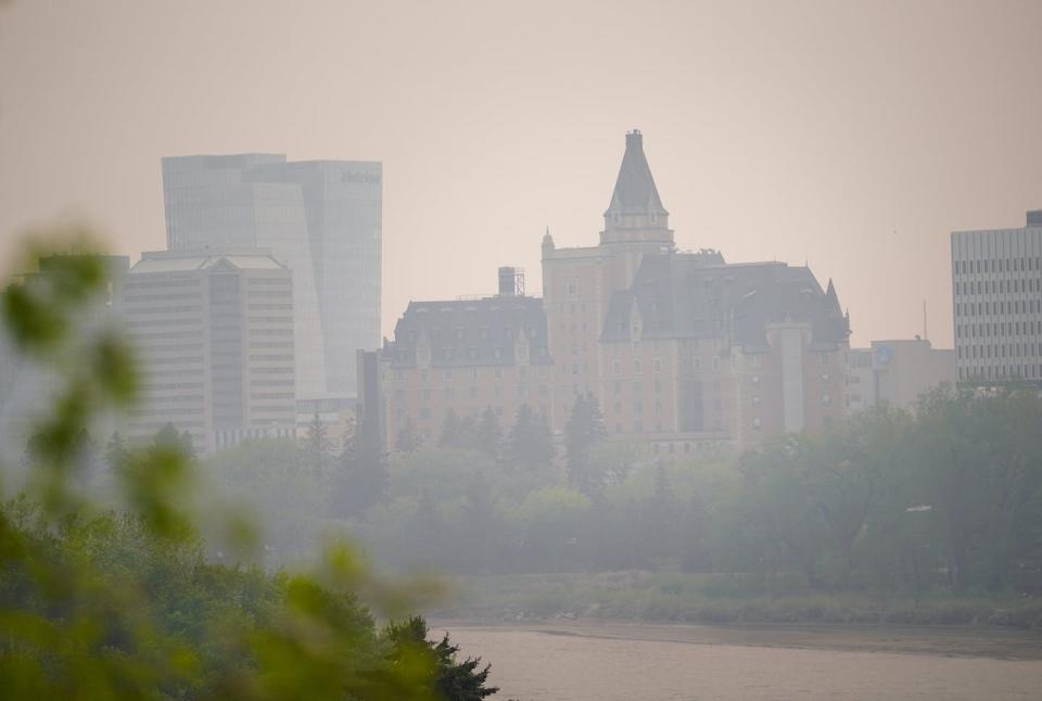 The Delta Hotels Bessborough in Saskatoon is photographed through thick smoke from wildfires burning across the Prairies on May 20. THE CANADIAN PRESS/Heywood Yu