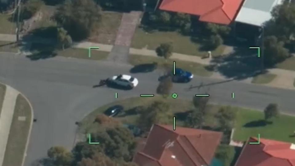 still from wa police video of motorbike crash and arrest