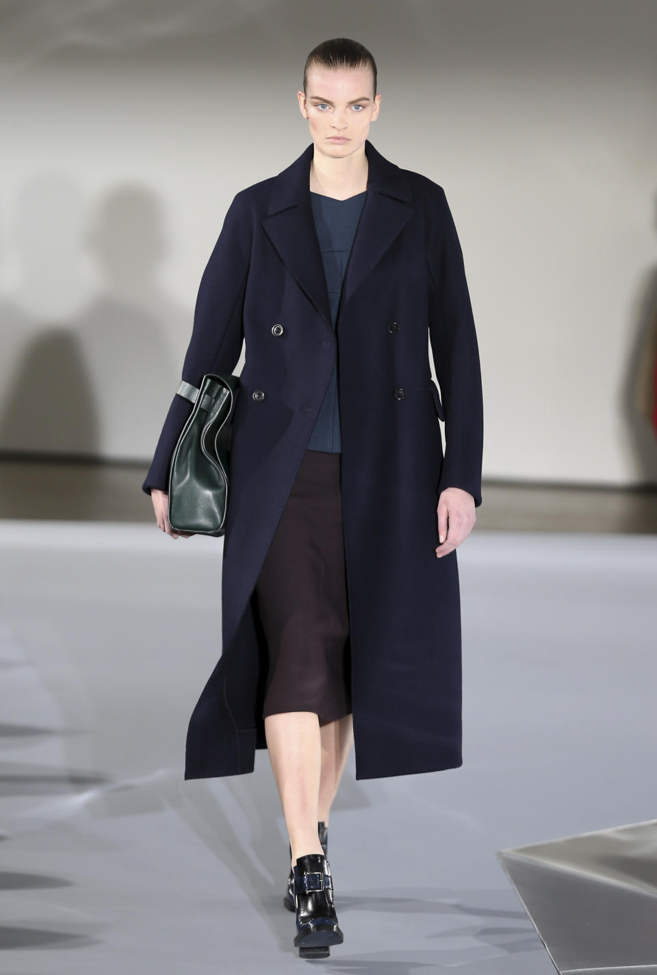 A model wears a creation for Jil Sander women's Fall-Winter 2013-14 collection, part of the Milan Fashion Week, unveiled in Milan, Italy, Saturday, Feb. 23, 2013. (AP Photo/Antonio Calanni)