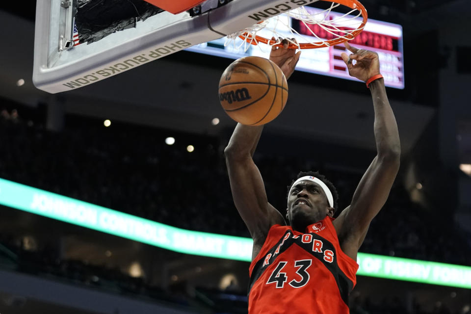 Toronto Raptors' Pascal Siakam dunks against the Milwaukee Bucks during the first half of an NBA basketball game Sunday, March 19, 2023, in Milwaukee. (AP Photo/Aaron Gash)