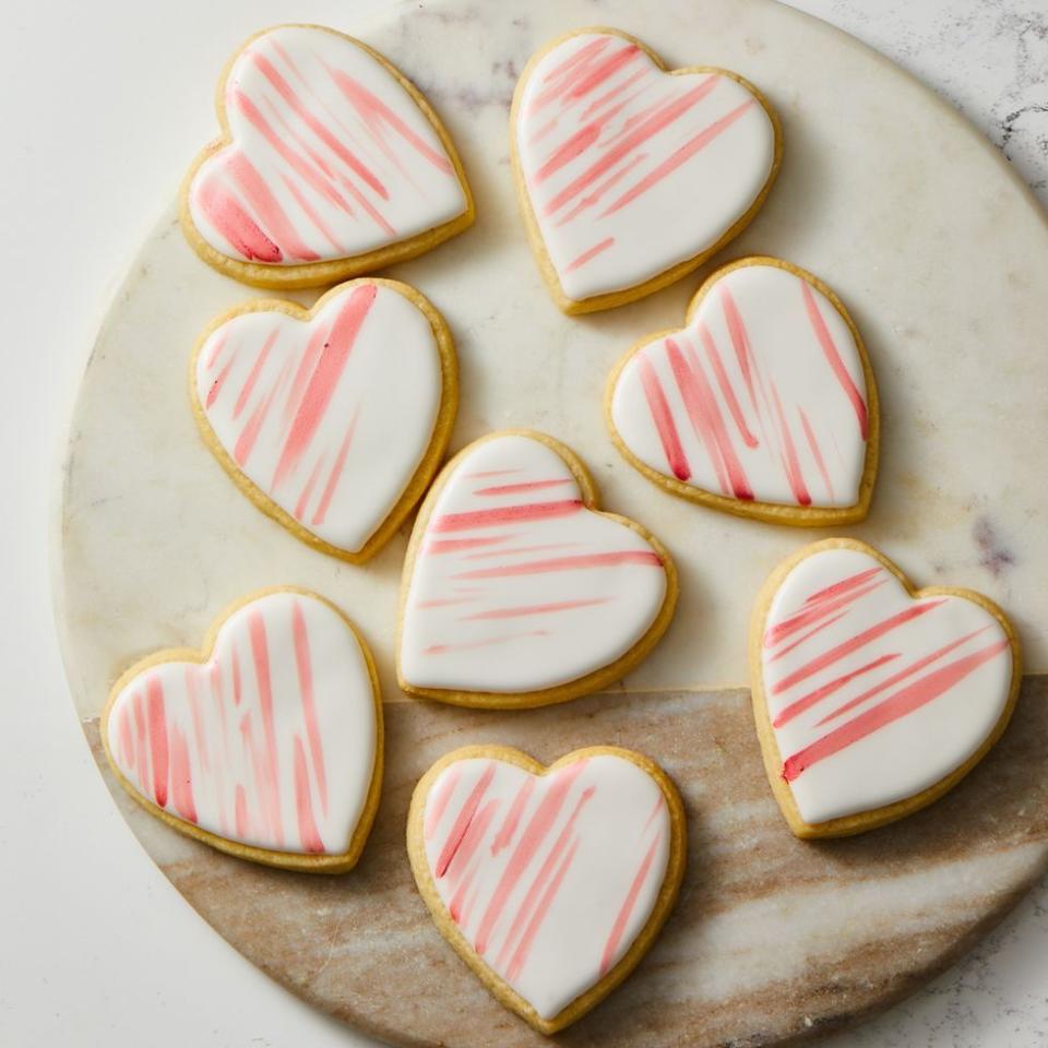 <p>A little bit of luster dust (an edible powder made for decorating) combined with vodka makes a pretty-in-pink "paint" to decorate these cutest-ever cookies.</p><p><a class="link " href="https://www.amazon.com/Wilton-2304-115-Nesting-Heart-Cutter/dp/B0000CF4KC?tag=syn-yahoo-20&ascsubtag=%5Bartid%7C10067.g.42706470%5Bsrc%7Cyahoo-us" rel="nofollow noopener" target="_blank" data-ylk="slk:Shop Now;elm:context_link;itc:0;sec:content-canvas">Shop Now</a></p><p>Get the <strong><a href="https://www.goodhousekeeping.com/food-recipes/a34865774/heart-shaped-cookie-recipe/" rel="nofollow noopener" target="_blank" data-ylk="slk:Heart-Shaped Cookies recipe;elm:context_link;itc:0;sec:content-canvas" class="link ">Heart-Shaped Cookies recipe</a></strong>.<br></p>