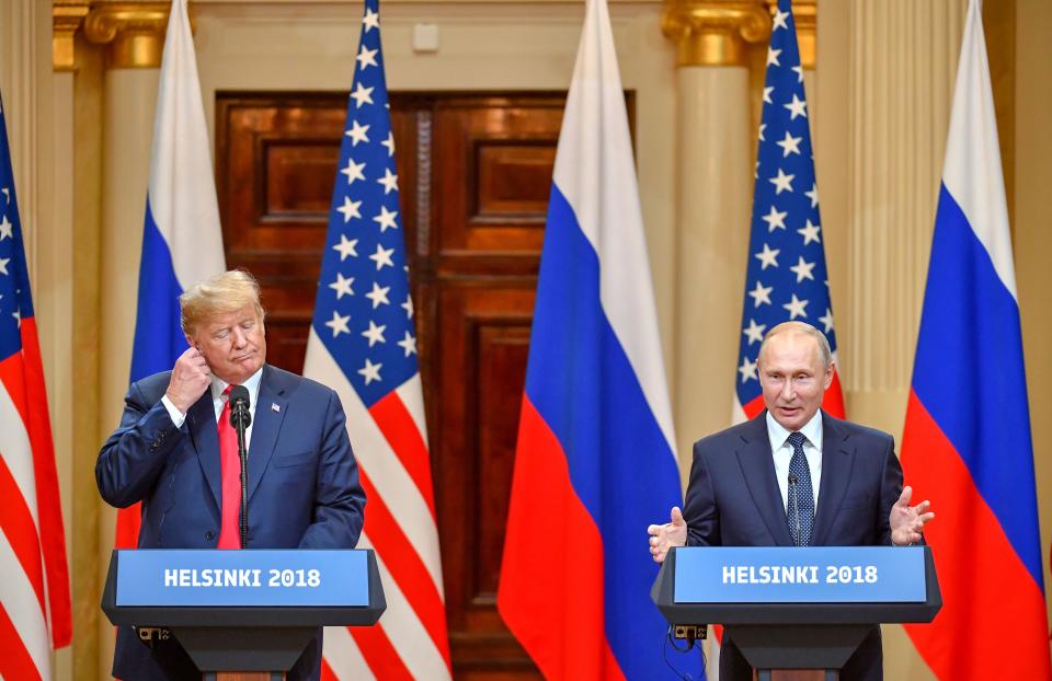 <p>U.S. President Donald Trump (L) and Russia’s President Vladimir Putin attend a joint press conference after a meeting at the Presidential Palace in Helsinki, on July 16, 2018. (Photo: Yuri Kadobnov/AFP/Getty Images) </p>