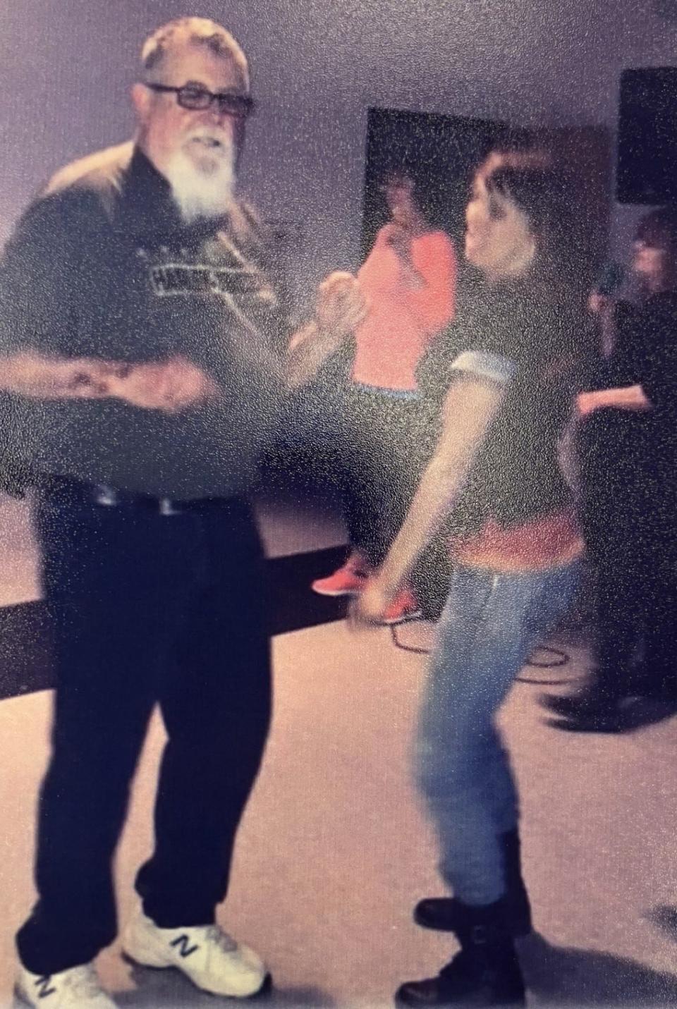 Marianne Weis, right, dances with her father David Toth.