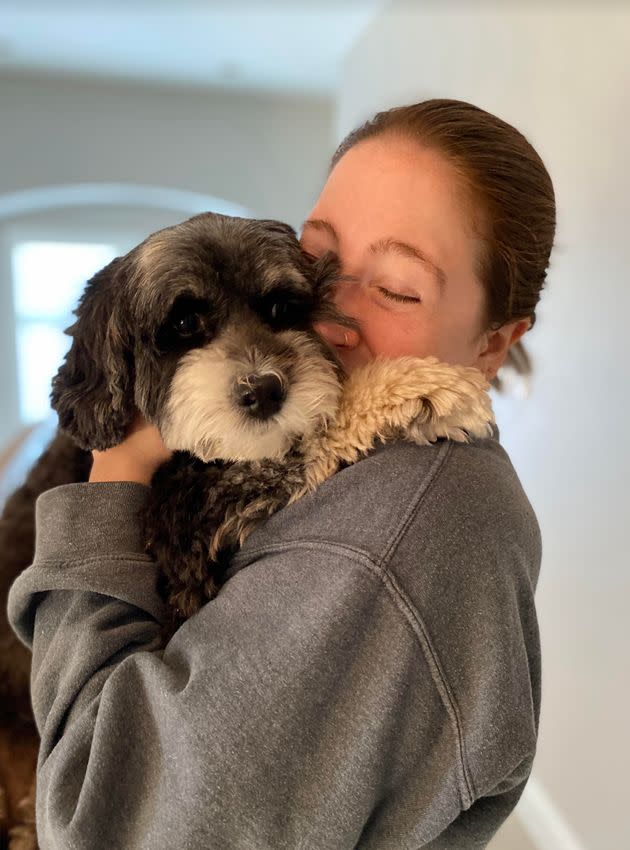 Liza dancing with the family's dog, Penny.