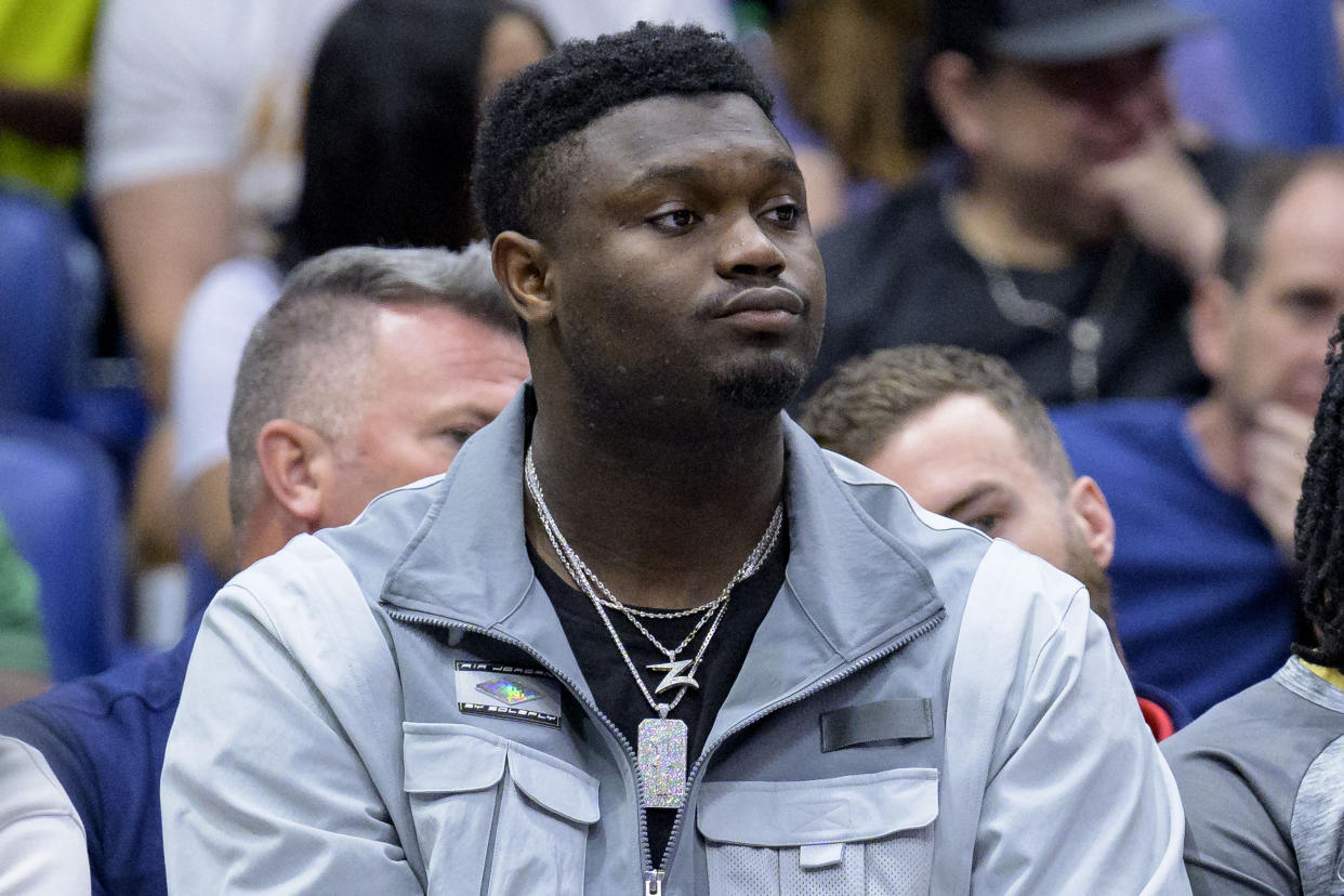 New Orleans Pelicans forward Zion Williamson watches in the first half of an NBA basketball game against the Portland Trail Blazers in New Orleans, Sunday, March 12, 2023. (AP Photo/Matthew Hinton)