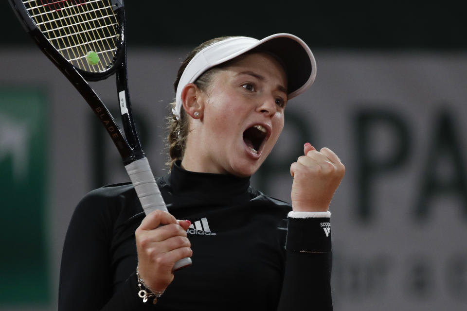 Latvia's Jelena Ostapenko celebrates winning her second round match of the French Open tennis tournament against Karolina Pliskova of the Czech Republic in two sets, 6-4, 6-2, at the Roland Garros stadium in Paris, France, Thursday, Oct. 1, 2020. (AP Photo/Alessandra Tarantino)