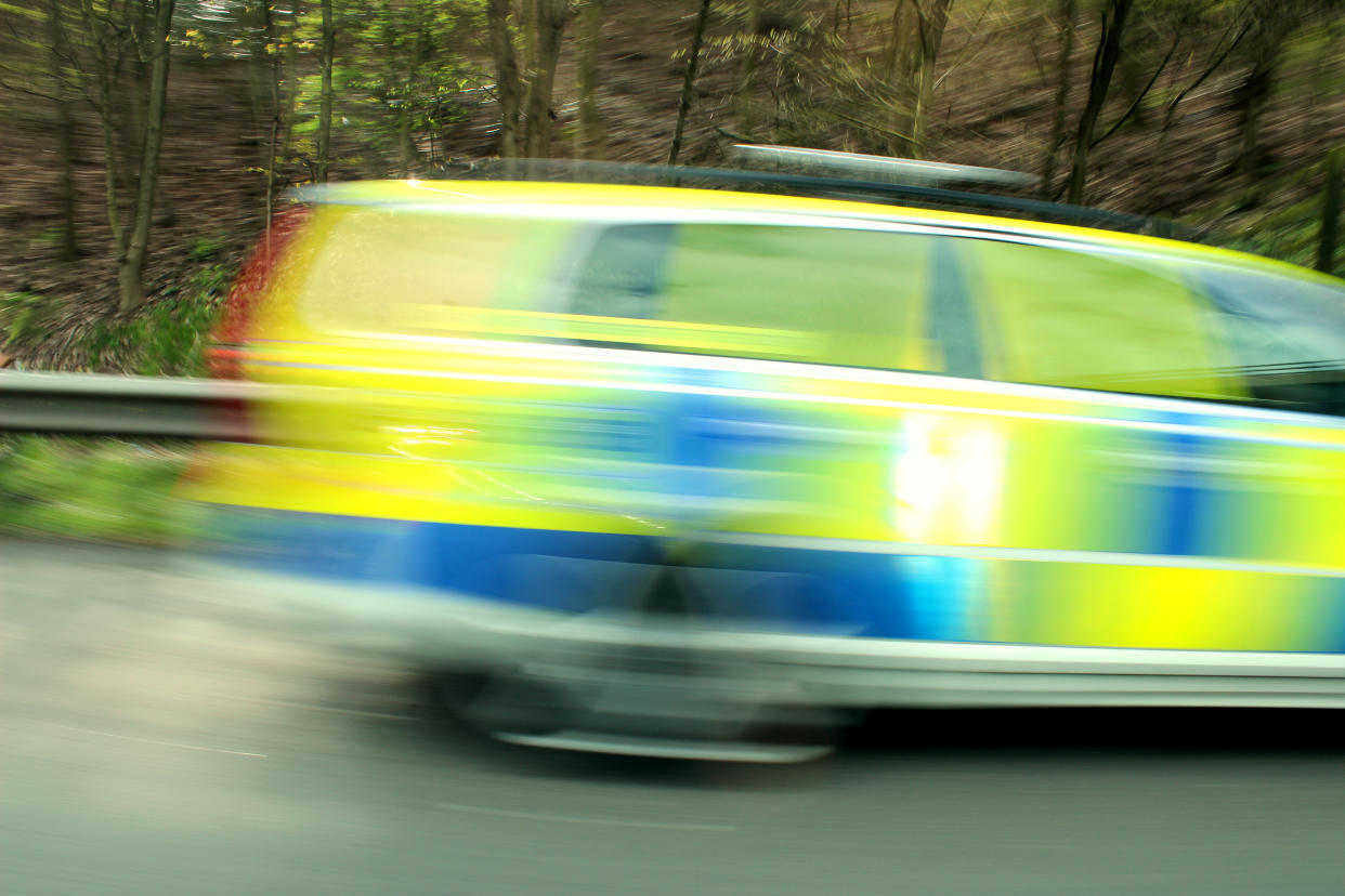 Fast moving U.K police car blur.