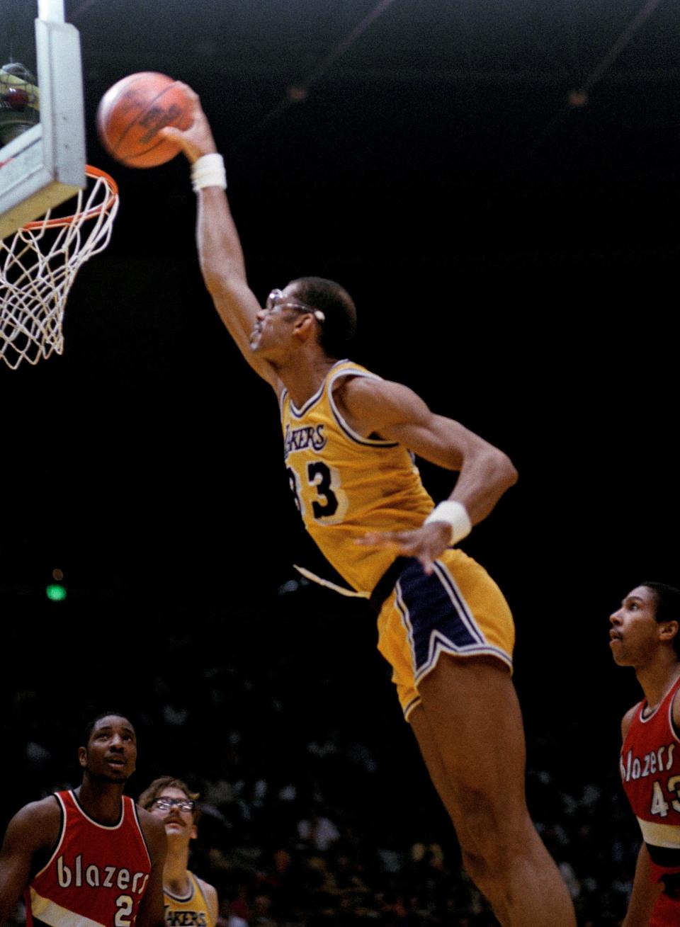 Los Angeles Lakers Kareem Abdul-Jabbar (33) approaches the basket in the second game of the NBA basketball playoffs against the Portland Trailblazers in Los Angeles in April 26, 1983.