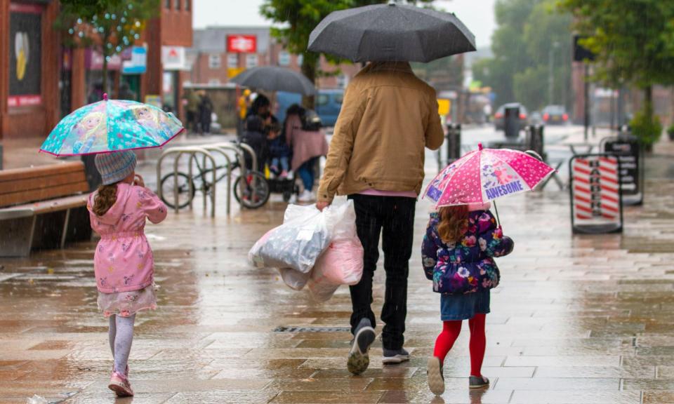 <span>Wet weather held back the UK retail sector in April.</span><span>Photograph: ZarkePix/Alamy</span>