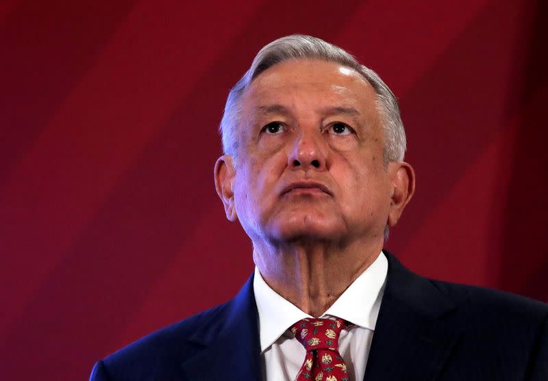 FILE PHOTO: Mexico's President Andres Manuel Lopez Obrador looks up during a news conference at the National Palace in Mexico City