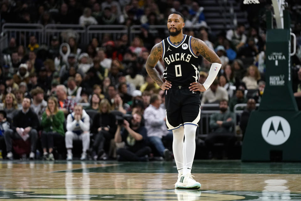 Milwaukee Bucks' Damian Lillard waits for a free throw during the second half of an NBA basketball game against the Cleveland Cavaliers, Friday, Jan. 26, 2024, in Milwaukee. (AP Photo/Aaron Gash)