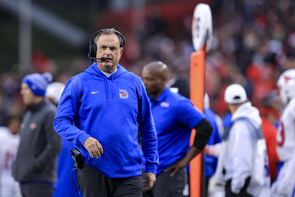 SMU head coach Sonny Dykes works the sidelines during an NCAA college football game against Cincinnati, Saturday, Nov. 20, 2021, in Cincinnati. Cincinnati won 48-14. (AP Photo/Aaron Doster)