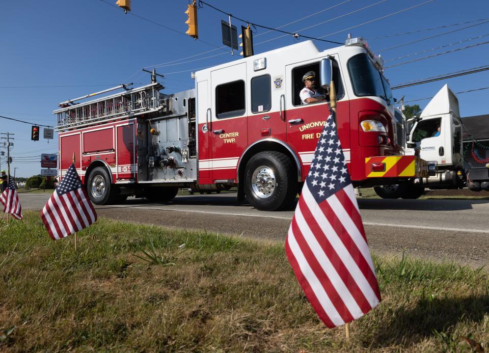 A fire engine leaves Freeport Senior High in Freeport Pennsylvania as a motorcade of fire engines and EMS vehicles headed off to the funeral of Corey Comperatore the Buffalo Township man killed at SaturdayÕs rally for former President Donald Trump from a would-be assassinÕs stray bullet. Kevin Whitlock / Massillon Independent