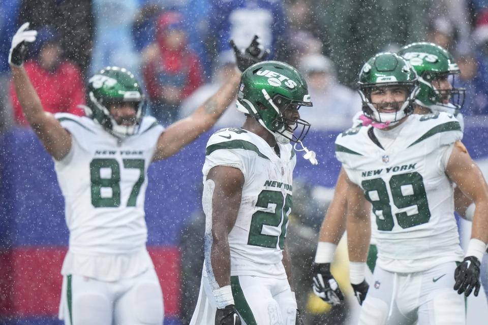 New York Jets running back Breece Hall (20) celebrates after running in a touchdown during the first half of an NFL football game against the New York Giants, Sunday, Oct. 29, 2023, in East Rutherford, N.J. (AP Photo/Frank Franklin II)