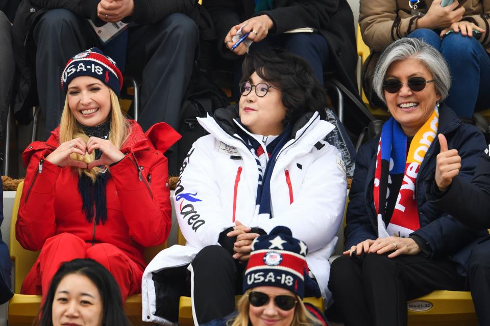 <p>Ivanka Trump (L) shows the heart sign with her hands with wife of Korean President Moon Jae-in, Kim Jung-sook (C) and Korean foreign minister Kang Kyung-wha (R) attending the final of the men’s snowboard big air event at the Alpensia Ski Jumping Centre during the Pyeongchang 2018 Winter Olympic Games on February 24, 2018 in Pyeongchang. / AFP PHOTO / FRANCK FIFE </p>