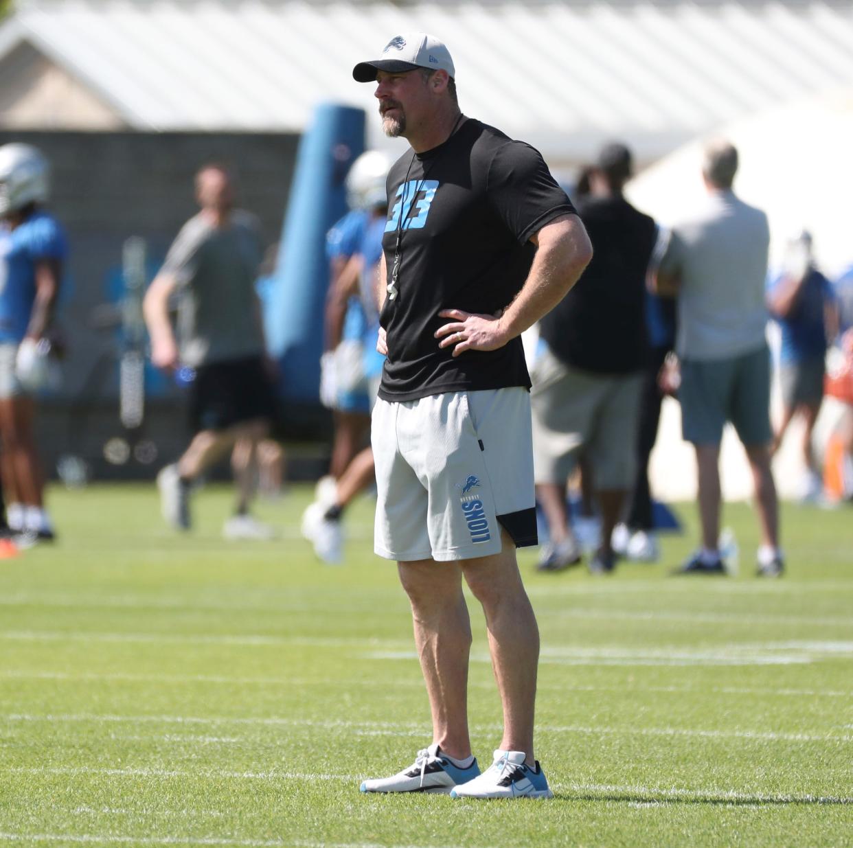 Head coach Dan Campbell watches Detroit Lions rookie minicamp Saturday, May 14, 2022 at the Allen Park practice facility.