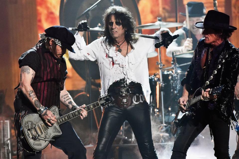 Johnny Depp, Alice Cooper, and Joe Perry of Hollywood Vampires perform onstage during The 58th GRAMMY Awards at Staples Center on February 15, 2016 in Los Angeles, California