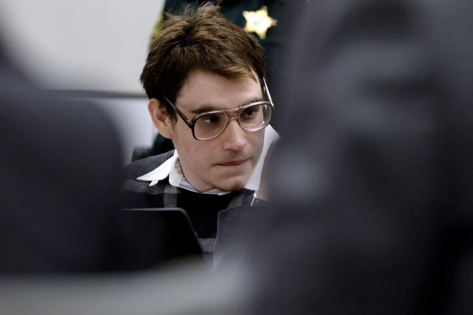 Marjory Stoneman Douglas High School shooter Nikolas Cruz is shown at the defense table just before his defense team announced their intention to rest their case during the penalty phase of Cruz's trial at the Broward County Courthouse in Fort Lauderdale on Wednesday, Sept. 14, 2022. Cruz previously plead guilty to all 17 counts of premeditated murder and 17 counts of attempted murder in the 2018 shootings. (Amy Beth Bennett/South Florida Sun Sentinel via AP, Pool)