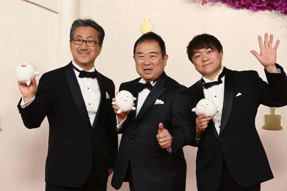 Hiroyuki Fukuda (left), Kiyofumi Nakajima and Kenichi Yoda before they won for “The Boy and the Heron.” David Fisher/Shutterstock