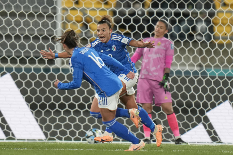 Italy's Arianna Caruso, center, celebrates after scoring the opening goal during the Women's World Cup Group G soccer match between South Africa and Italy in Wellington, New Zealand, Wednesday, Aug. 2, 2023. (AP Photo/Alessandra Tarantino)