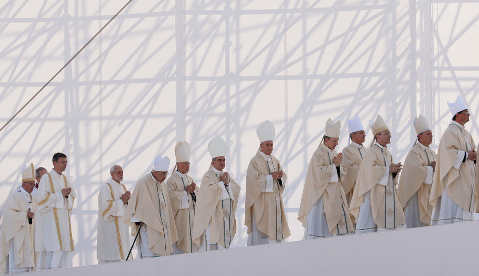 Pope Francis arrive for a Mass in Genoa