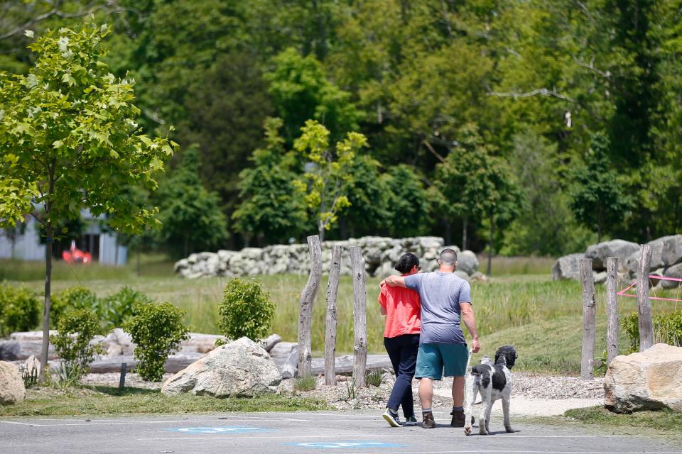 A copule enjoy one of the many trails at the Westport Land Conservation Trust Adamsville Road location as it celebrates its 50th anniversary.