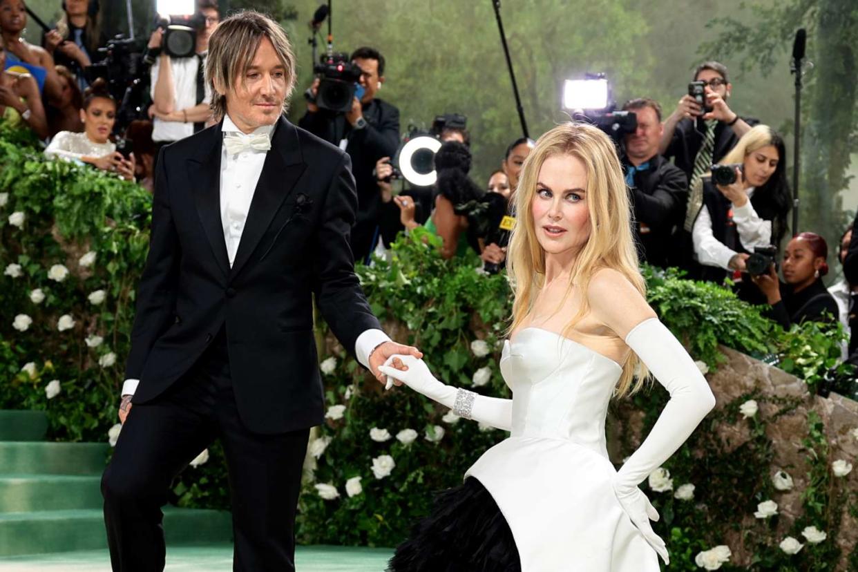 <p>Dimitrios Kambouris/Getty</p> Keith Urban and Nicole Kidman at the 2024 Met Gala