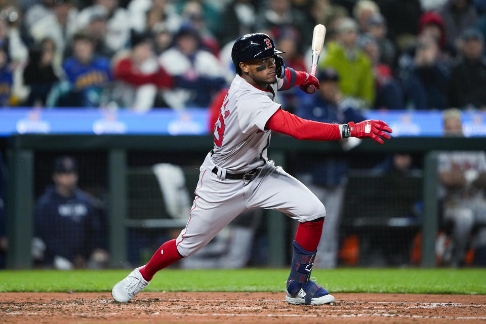 Boston Red Sox's Ceddanne Rafaela watches his single against the Seattle Mariners during the seventh inning of a baseball game Friday, March 29, 2024, in Seattle. (AP Photo/Lindsey Wasson)