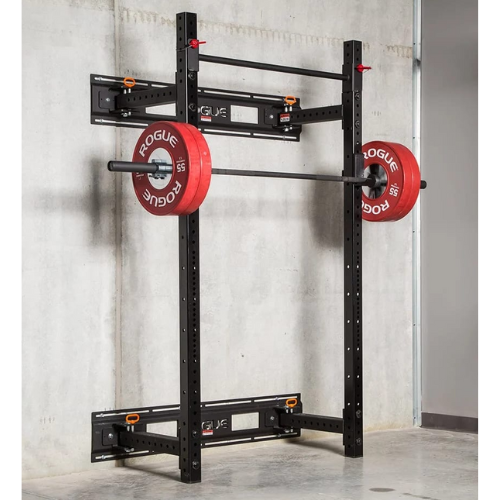 Rogue RML 3WC Fold Back Wall Mount Squat Rack against concrete wall