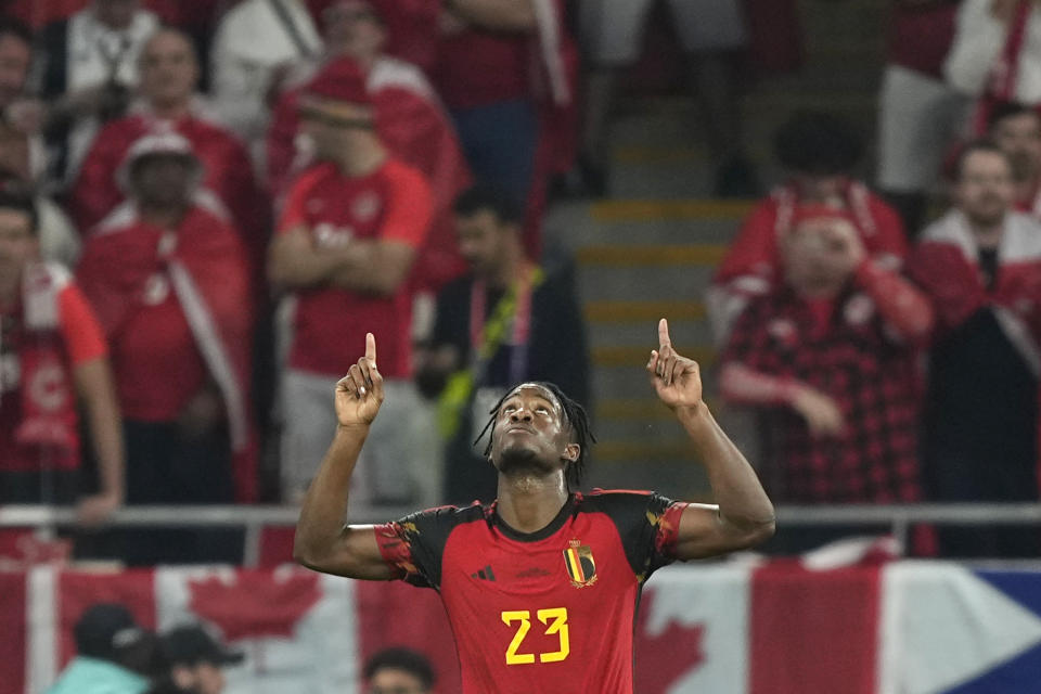 Belgium's Michy Batshuayi celebrates after scoring his side's opening goal during the World Cup group F soccer match between Belgium and Canada, at the Ahmad Bin Ali Stadium in Doha, Qatar, Wednesday, Nov. 23, 2022. (AP Photo/Martin Meissner)