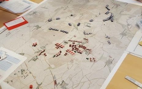 A Kriegsspiel ("war game") session in progress