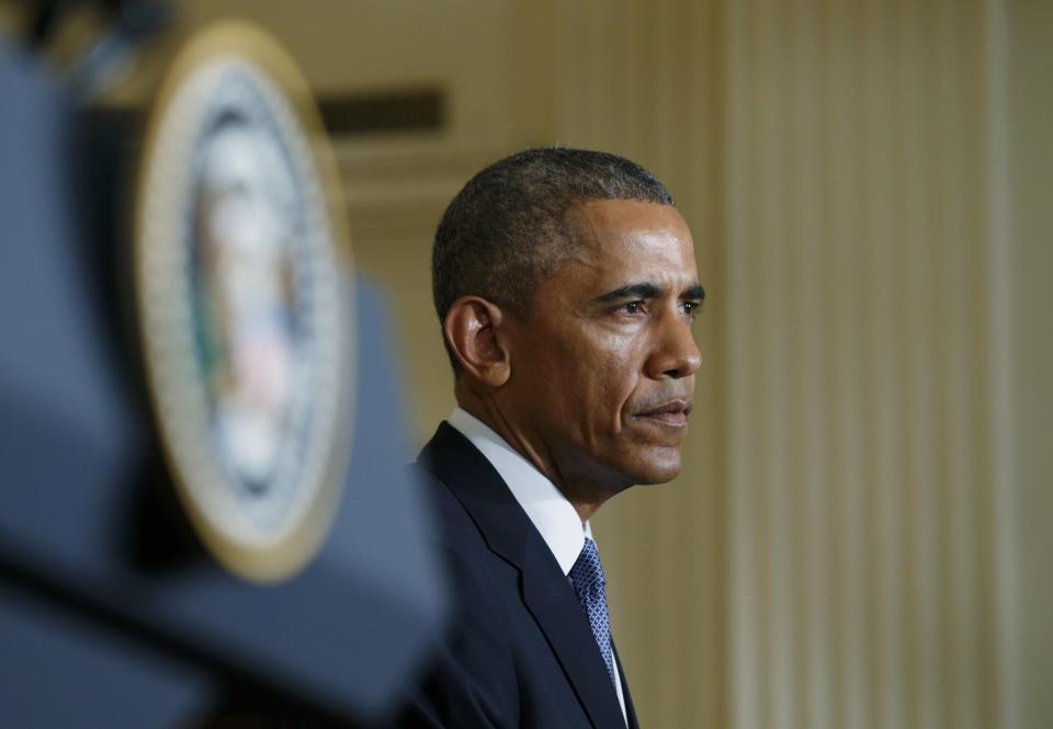 U.S. President Barack Obama faces a joint news conference with British Prime Minister David Cameron (Not Pictured) following their meeting at the White House in Washington January 16, 2015. REUTERS/Kevin Lamarque (UNITED STATES - Tags: POLITICS)