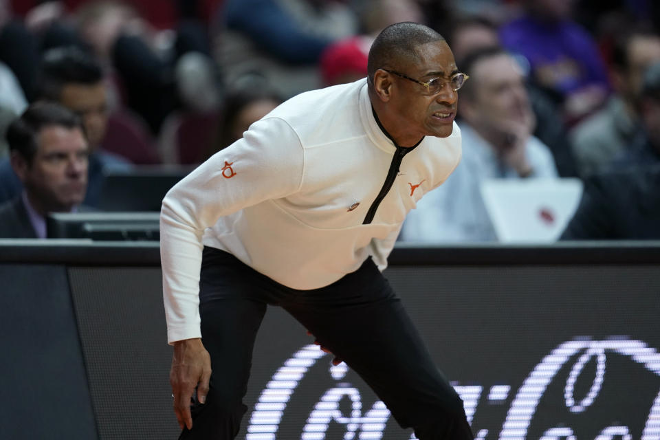 Texas interim head coach Rodney Terry watches from the bench in the first half of a first-round college basketball game against Colgate in the NCAA Tournament, Thursday, March 16, 2023, in Des Moines, Iowa. (AP Photo/Charlie Neibergall)