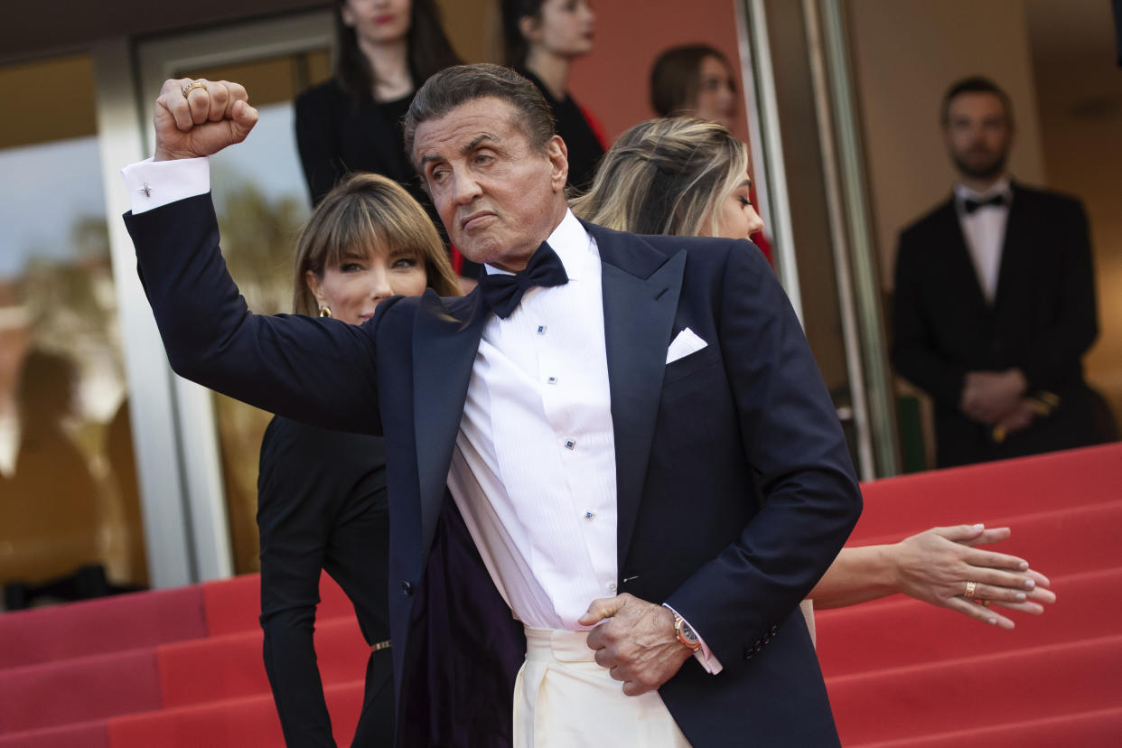 Sylvester Stallone, Sistine Stallone and Jennifer Flavin pose for photographers upon arrival at the awards ceremony of the 72nd international film festival, Cannes, southern France, Saturday, May 25, 2019. (Photo by Vianney Le Caer/Invision/AP)
