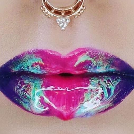 Mix up your beauty routine with these new holographic lip glosses. Photo: Instagram/@makeupby_av