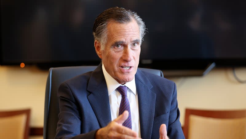 Sen. Mitt Romney, R-Utah, meets with Senate Democrats during their caucus meeting at the Capitol in Salt Lake City on Thursday, Feb. 15, 2024.