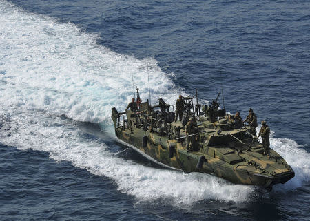 A riverine command boat from Riverine Detachment 23 operates during a maritime air support operations center exercise in the Arabia Gulf in this June 12, 2012 handout photo, provided by the U.S. Navy, January 12, 2016. REUTERS/Mass Communication Specialist 2nd Class Zane Ecklund/U.S. Navy/Handout via Reuters