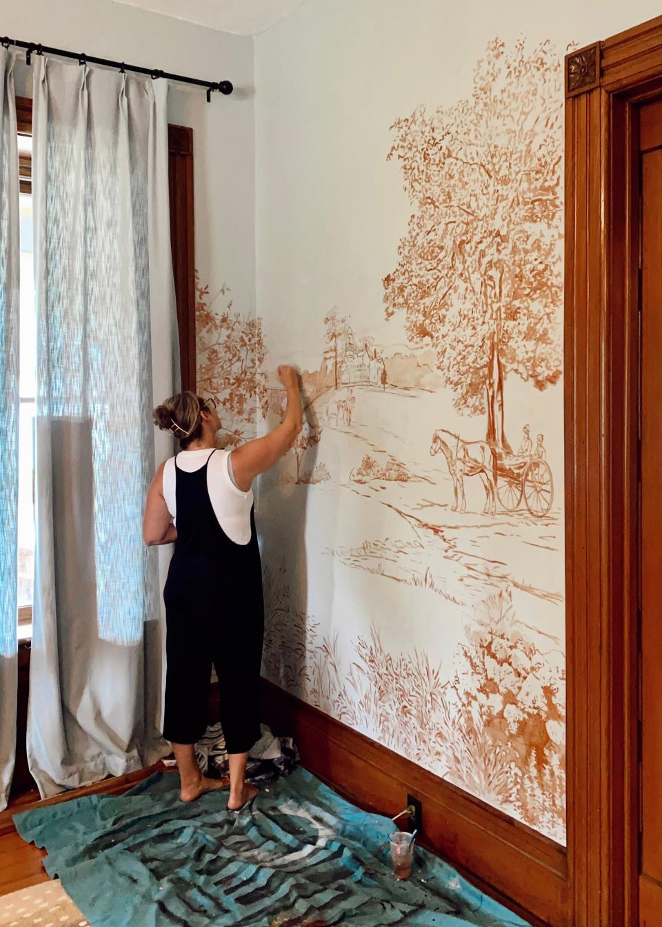 “As opposed to painting a portrait, when you paint a mural in someone’s home they see the whole process, not just the finished project. And it helps create this relationship and feel more connected to it,” said artist Mara Wilson.