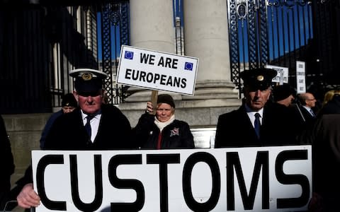 Anti-Brexit campaigners, Borders Against Brexit protest outside Irish Government buildings in Dublin, Ireland  - Credit: Reuters