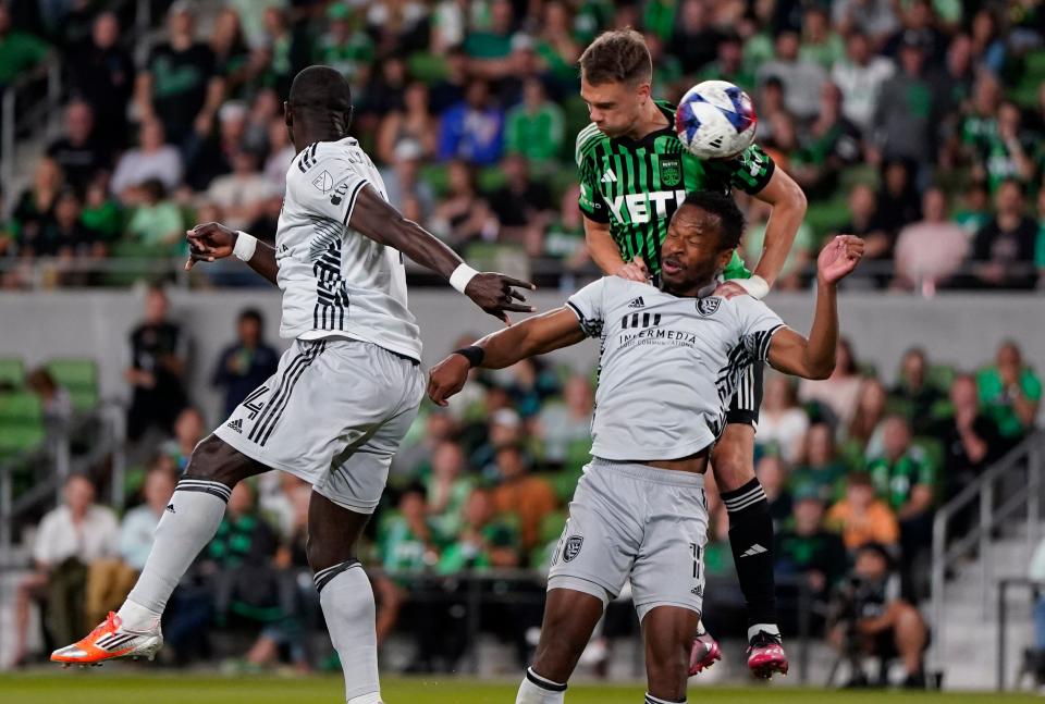 Austin FC defender Leo Vaisanen, top right, heads the ball past San Jose Earthquakes forward Jeremy Ebobisse during their April 29 match at Q2 Stadium. El Tree, which hasn't won an MLS matchup in its last eight tries, plays at the Western Conference-leading Seattle Sounders on Wednesday.