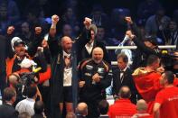 Tyson Fury celebrates after being declared the winner of the fight as Wladimir Klitschko looks dejected Reuters / Ina Fassbender Livepic