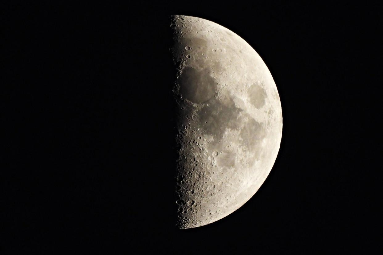 First Quarter Moon also called a Half Moon since we see exactly 50% of the Moon's visible surface illuminated