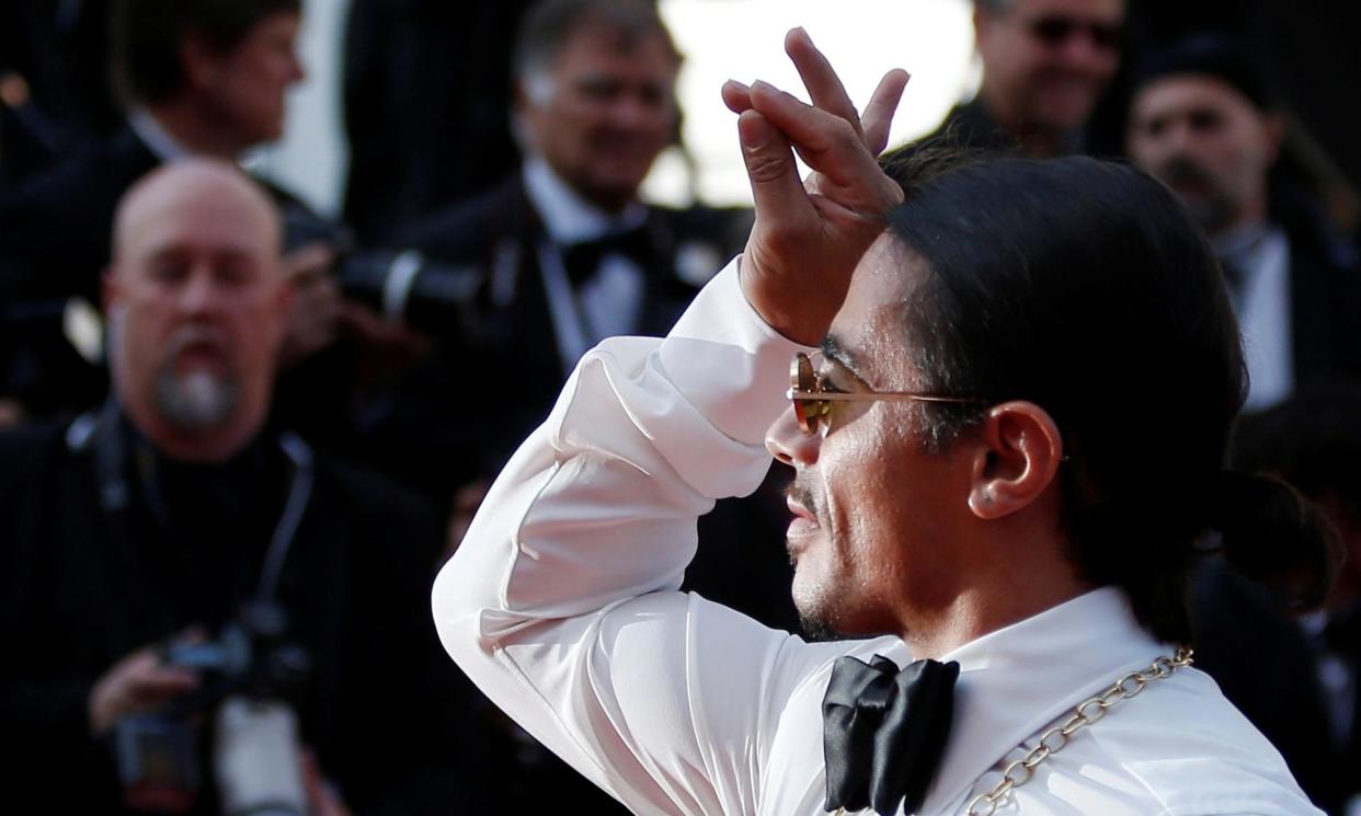 <span>Nusret Gökçe, known as Salt Bae, at the 2019 Cannes film festival. The Turkish butcher, chef and restaurateur has nearly 54 million Instagram followers.</span><span>Photograph: Stéphane Mahé/Reuters</span>