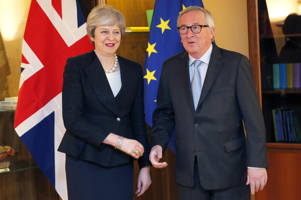 British Prime Minister Theresa May, left, poses for the media with European Commission President Jean-Claude Juncker in Strasbourg, France, Monday, March 11, 2019. May flew to Strasbourg, late Monday to try to secure a last-minute deal with the bloc. (Vincent Kessler/Pool Photo via AP)